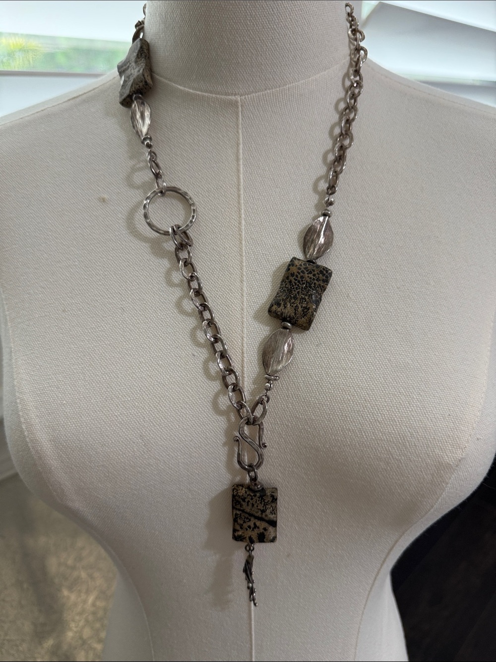 Long Silver-Tone Necklace with Black-Gold Speckled Stones